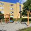 Single Swing (BNS 90cm) in a playground near apartment buildings