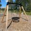 Outdoor swing set, Single Swing (BNS 90cm), in a playground with woodchip ground.