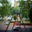 Double Tyre double swing in a park setting.