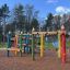 Colorful Crayons wooden playhouse in a playground.
