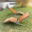 Marseille Deck Chair by the riverside on a grassy lawn
