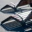 Modern Montpellier Deck Chair outdoor furniture on a paved surface.