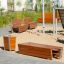 Ryga Bin Light outdoor wooden trash bin with metal frame on playground area