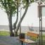 Ryga Bench w/ Backrest in a park