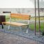 Ryga Bench w/ Backrest in a park setting'