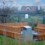Outdoor seating arrangement with Ryga Deco Bench with Backrest.