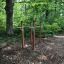 Outdoor fitness station Bars I in a forest.