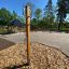 Outdoor playground equipment Handles for climbing with wood chips surface