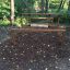 Outdoor fitness obstacle named Overâ€under in a wooded park.