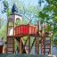 Alcazar playground castle with slides and climbing structures in a park
