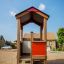 Wooden Playhouse for Kids in a Playground