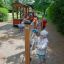 Children playing on Abacus outdoor playground equipment.