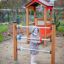 Child playing with Abacus on a playground.