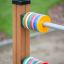 Abacus - playground equipment with colorful discs on rods.