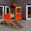 Wooden Playhouse with slide in a schoolyard.