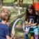 Children playing with Rings playground equipment.
