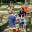 Children playing on a Rings playground equipment.