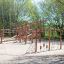 Playground with Ural climbing net in a park setting