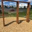 Wooden climbing frame for children named Irish Table in an outdoor playground.