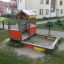 Villa sandbox with a playhouse in a residential area.