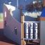 Steamboat ship with slide with tic-tac-toe game on playground.