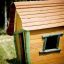 Wooden playhouse for children named Crooked House.