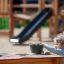 Child playing with Sand & Water Play Table outdoors.