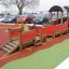 Locomotive with cars train playhouse in a playground.