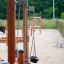 Sand & Water Play III - children's outdoor play equipment with sand and water stations.