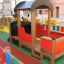 Wooden locomotive train playhouse in colorful playground