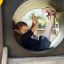 A child playing inside a Locomotive train playhouse tunnel.
