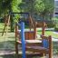 Wooden playground equipment Captain's Bridge in a schoolyard.