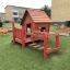 Wooden playhouse with bridge in playground, Anna's Playhouse.