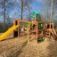 Jungle castle with slide in a playground.