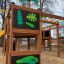 Wooden jungle castle with slide for children.