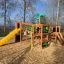 Jungle castle with slide in a playground.