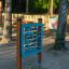 Interactive outdoor Find Pairs Board for children in a park setting.