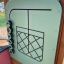 Interactive panel of Stall playground equipment with basket design.