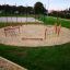 Outdoor Trim Trail Nature III adventure playground set in a park.