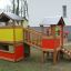 Knight's Castle playhouse with slide outdoor playground.