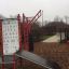 Outdoor fitness equipment Information Board NAF MEDIUM in park setting.