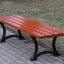 Outdoor wooden Bordeaux Bench w/o Backrest on a park pathway.
