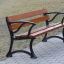 Bordeaux Bench w/ Armrests on a park pathway.