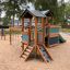 Wooden Tower playhouse with slide in a playground