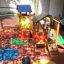 Tower playhouse with slide and climbing net in an outdoor play area