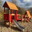 Play structure with slide and climbing elements from Lasse's House.