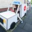 Child playing in an Ambulance-themed playground toy.
