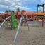 El Dorado wooden playhouse in a playground.
