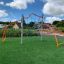 Cassiopeia steel structure playground climbing equipment on artificial grass.