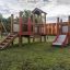 Fortress playhouse with slide on a playground